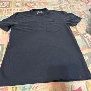 Faherty Sunwashed organic cotton navy blue short sleeve tee.